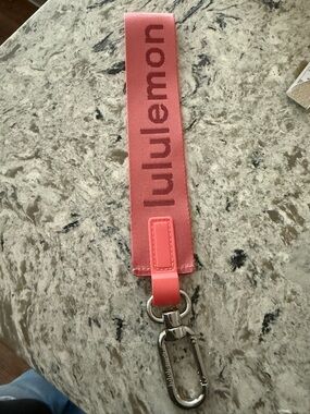 Lululemon Coral Pink never lost key chain